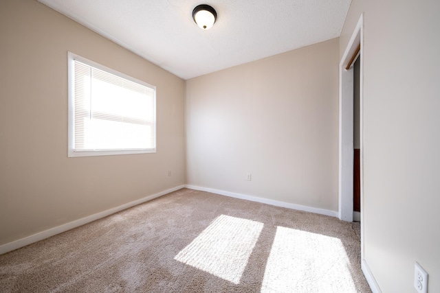 8247 Wentworth Ave S, Bloomington, MN 55420 - empty room with carpet flooring and baseboards