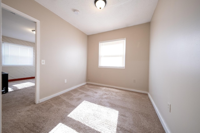 8247 Wentworth Ave S, Bloomington, MN 55420 - carpeted empty room featuring a smoke detector and baseboards