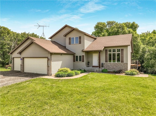 75 County Road F, Troy Twp, WI 54022 - traditional-style house featuring an attached garage, gravel driveway, a front yard, and a shingled roof