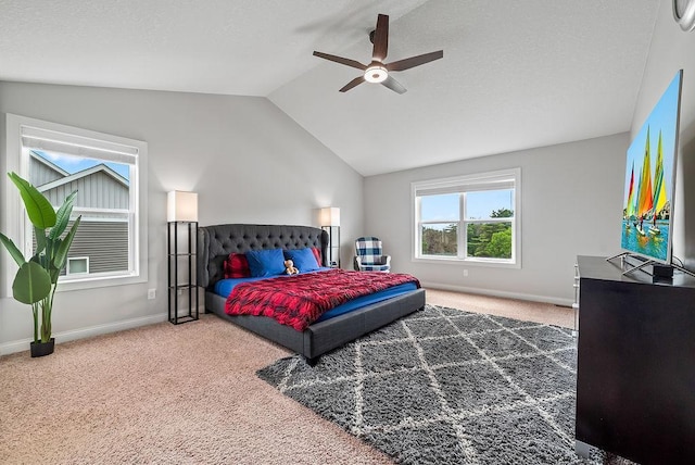 10388 188th St W, Lakeville, MN 55044 - carpeted bedroom with vaulted ceiling, baseboards, and a ceiling fan