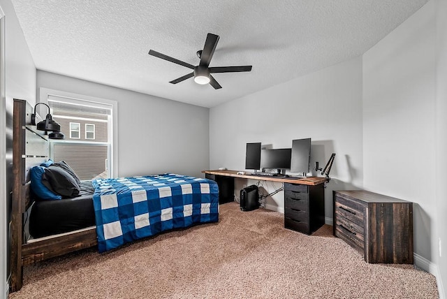 10388 188th St W, Lakeville, MN 55044 - bedroom featuring carpet floors, a textured ceiling, baseboards, a desk, and ceiling fan