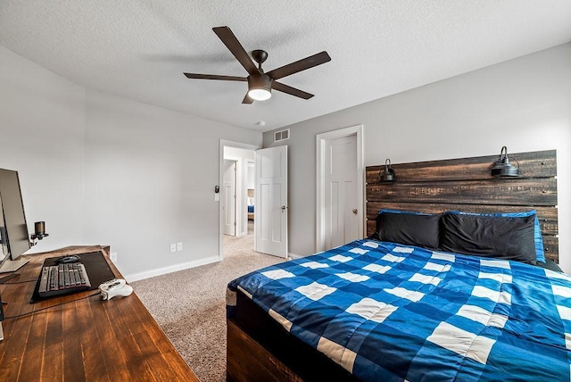 10388 188th St W, Lakeville, MN 55044 - carpeted bedroom featuring baseboards, a textured ceiling, and ceiling fan