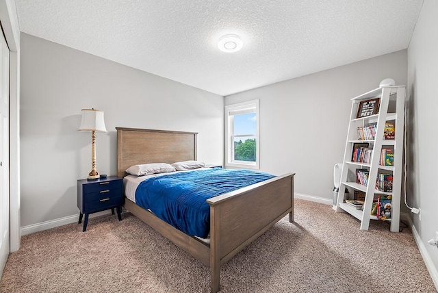 10388 188th St W, Lakeville, MN 55044 - carpeted bedroom featuring a textured ceiling and baseboards