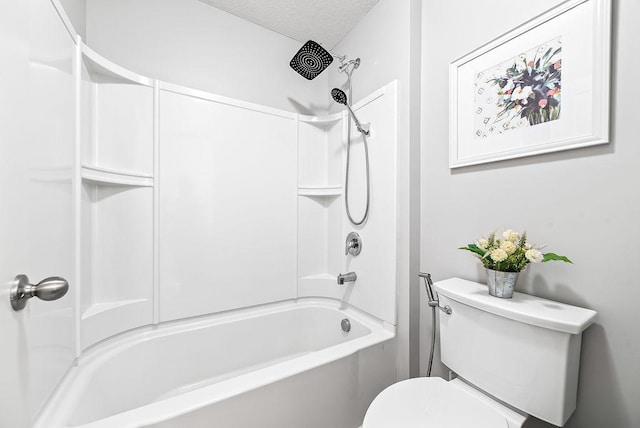 10388 188th St W, Lakeville, MN 55044 - bathroom featuring toilet, shower / bath combination, and a textured ceiling