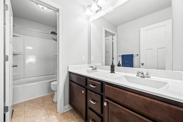 10388 188th St W, Lakeville, MN 55044 - full bathroom with double vanity, toilet, bathing tub / shower combination, a textured ceiling, and tile patterned floors