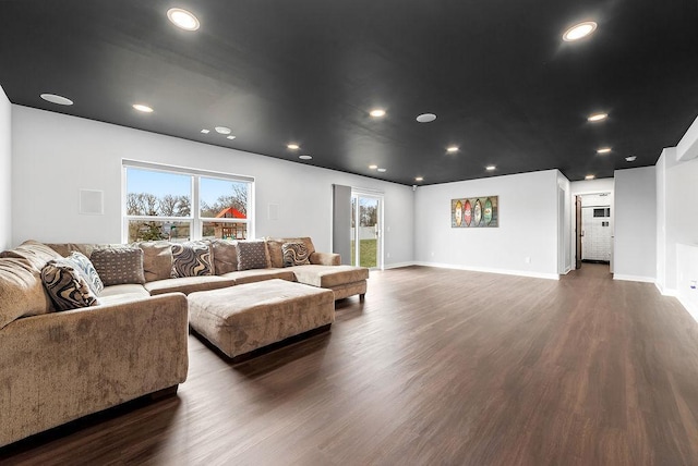 10388 188th St W, Lakeville, MN 55044 - living room featuring dark wood-style floors, baseboards, and recessed lighting