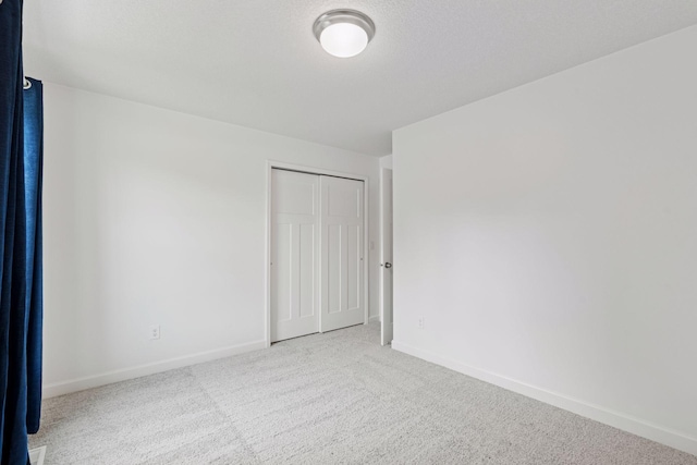 13571 141st Ave N, Dayton, MN 55327 - spare room featuring carpet flooring and baseboards