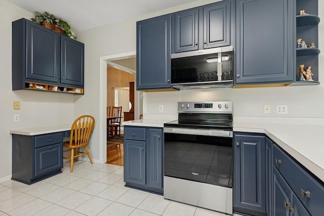 3114 Canyon Cir, Chaska, MN 55318 - kitchen with stainless steel electric range oven, open shelves, blue cabinetry, and light countertops