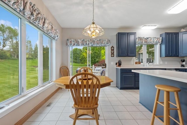 3114 Canyon Cir, Chaska, MN 55318 - dining room with a chandelier and light tile patterned floors