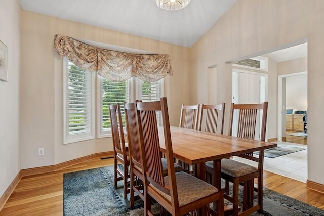3114 Canyon Cir, Chaska, MN 55318 - dining room featuring wood finished floors and vaulted ceiling