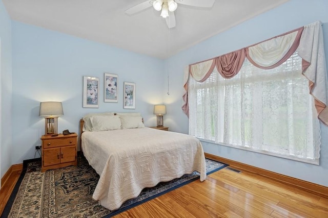 3114 Canyon Cir, Chaska, MN 55318 - bedroom featuring wood finished floors and ceiling fan