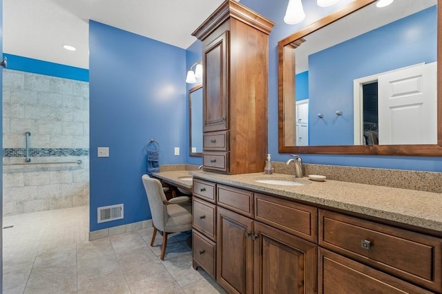 3114 Canyon Cir, Chaska, MN 55318 - bathroom with a walk in shower, vanity, a freestanding tub, and tile patterned flooring