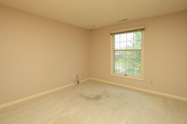 2051 Carriage Dr SW Unit 2051E, Rochester, MN 55902 - empty room with carpet flooring and baseboards
