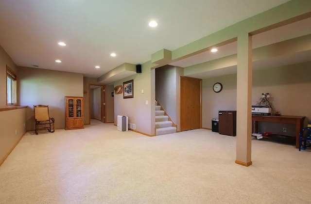 23501 Birch Cir, Rogers, MN 55374 - below grade area featuring light colored carpet, recessed lighting, stairway, and baseboards