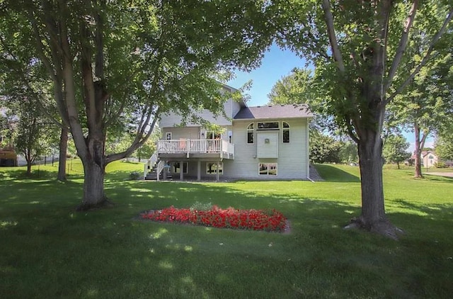 23501 Birch Cir, Rogers, MN 55374 - rear view of house featuring a deck, a yard, and stairs
