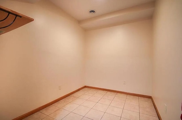 23501 Birch Cir, Rogers, MN 55374 - empty room featuring light tile patterned flooring and baseboards