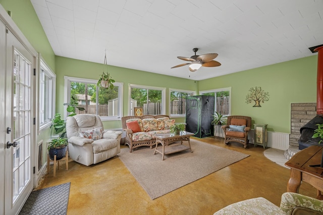 179 County Road F W, Shoreview, MN 55126 - living area with a ceiling fan and a wood stove
