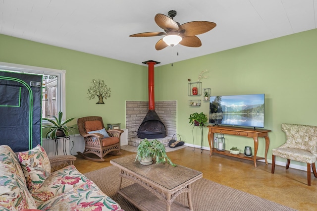 179 County Road F W, Shoreview, MN 55126 - living room featuring a wood stove and a ceiling fan