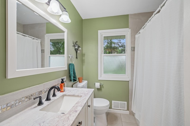 179 County Road F W, Shoreview, MN 55126 - full bath with vanity, healthy amount of natural light, tile patterned floors, and a shower with shower curtain