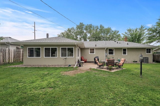 179 County Road F W, Shoreview, MN 55126 - back of property featuring a patio, a shingled roof, a chimney, and stucco siding