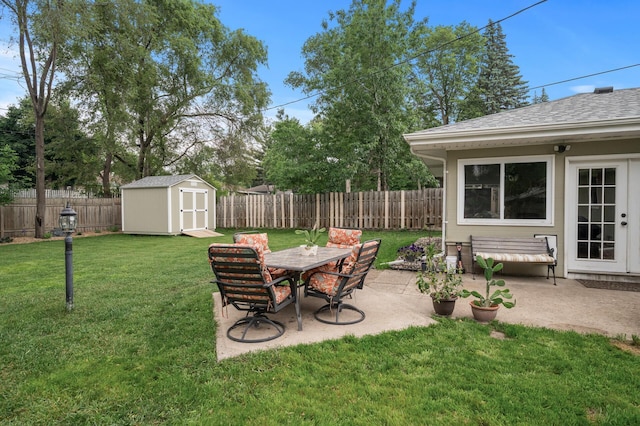 179 County Road F W, Shoreview, MN 55126 - fenced backyard with a patio and a storage unit