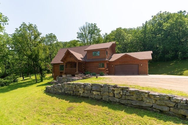 278 Vanity Dr, Shelby Twp, WI 54658 - log-style house with a garage, driveway, a front lawn, and a porch