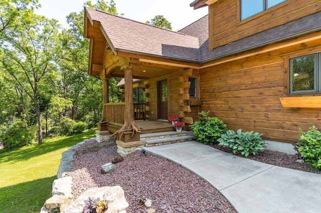 278 Vanity Dr, Shelby Twp, WI 54658 - property entrance featuring a shingled roof, a yard, and covered porch