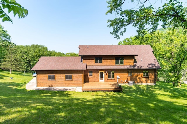 278 Vanity Dr, Shelby Twp, WI 54658 - rear view of house featuring a yard and a wooden deck