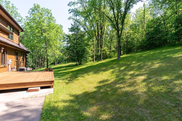 278 Vanity Dr, Shelby Twp, WI 54658 - view of green lawn with a wooden deck