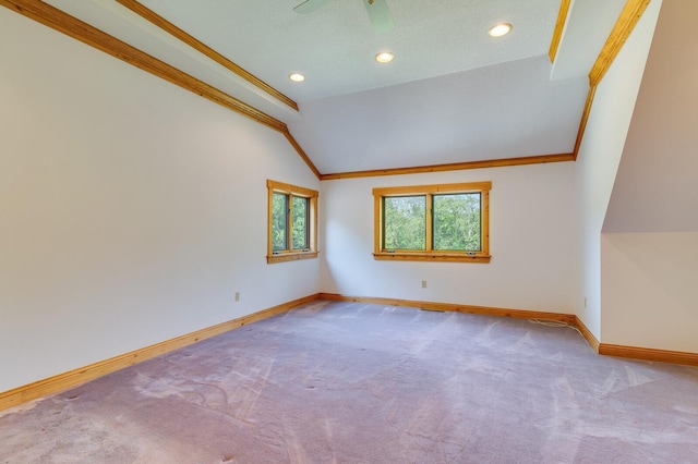 278 Vanity Dr, Shelby Twp, WI 54658 - spare room with vaulted ceiling, baseboards, carpet flooring, ornamental molding, and recessed lighting