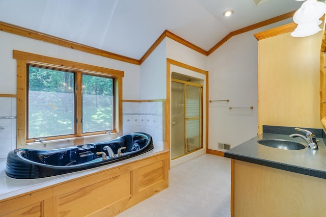 278 Vanity Dr, Shelby Twp, WI 54658 - bathroom with ornamental molding, a stall shower, vanity, a bath, and lofted ceiling