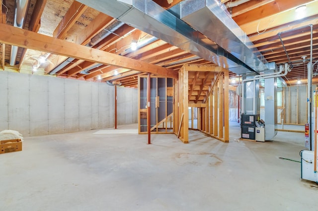 278 Vanity Dr, Shelby Twp, WI 54658 - unfinished basement with heating unit and stairs