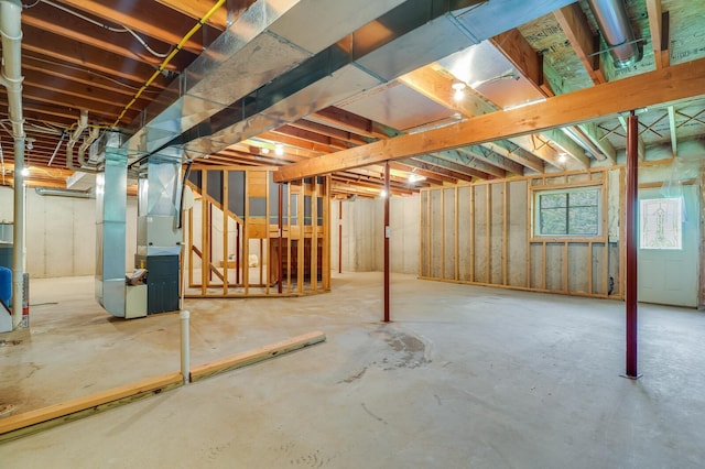 278 Vanity Dr, Shelby Twp, WI 54658 - basement with heating unit and stairs