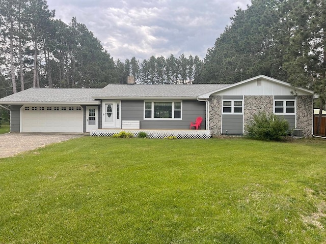 16173 Discovery Cir, Park Rapids, MN 56470 - ranch-style house featuring gravel driveway, an attached garage, a front yard, central AC, and a chimney