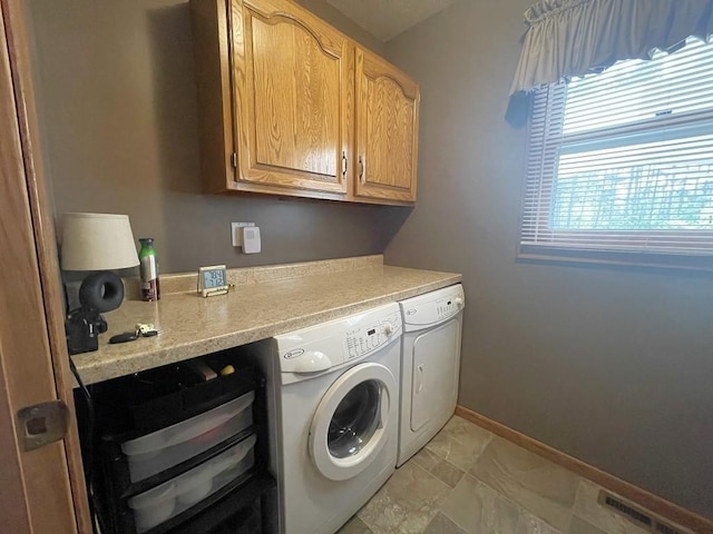 16173 Discovery Cir, Park Rapids, MN 56470 - laundry area with washer and clothes dryer, cabinet space, and baseboards