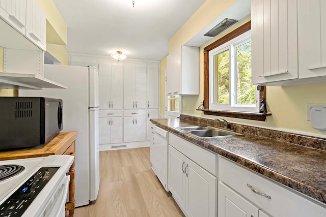 3671 Robinwood Ter, Minnetonka, MN 55305 - kitchen with white appliances, a sink, white cabinets, dark countertops, and light wood-style floors
