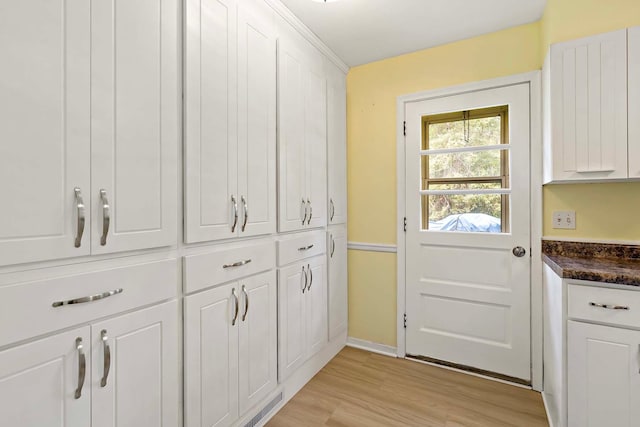 3671 Robinwood Ter, Minnetonka, MN 55305 - doorway to outside featuring light wood-style floors and baseboards