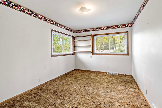 3671 Robinwood Ter, Minnetonka, MN 55305 - carpeted spare room featuring baseboards