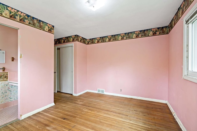 3671 Robinwood Ter, Minnetonka, MN 55305 - empty room featuring wood finished floors and baseboards