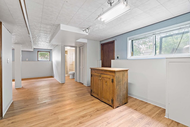 3671 Robinwood Ter, Minnetonka, MN 55305 - below grade area featuring light wood finished floors and baseboards