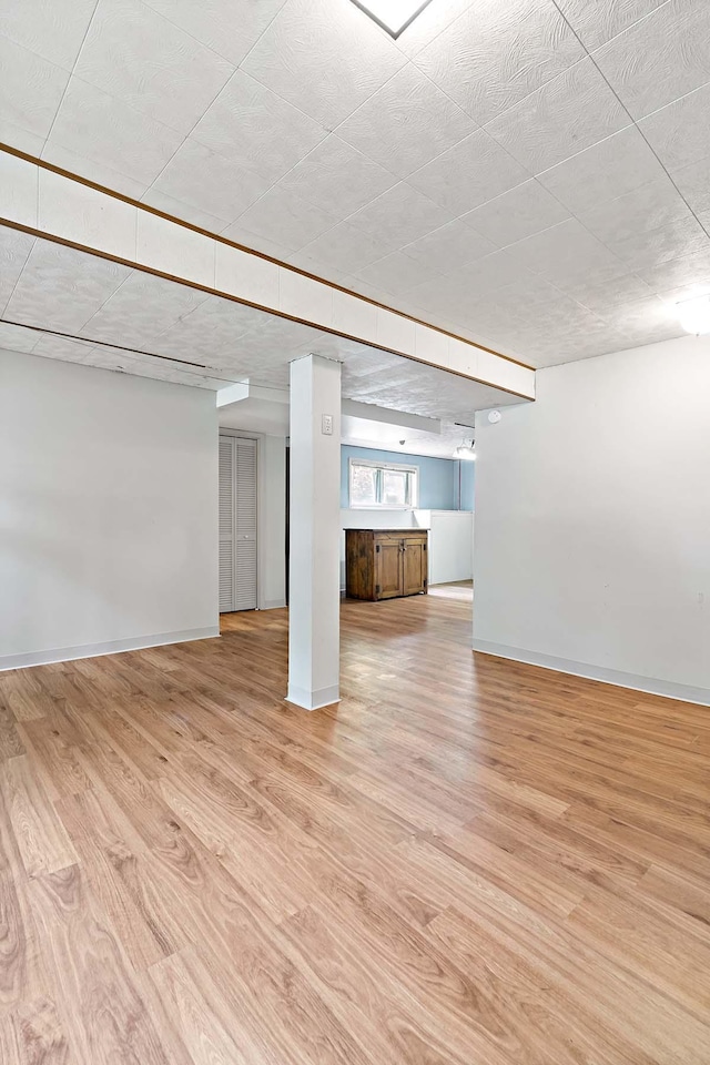 3671 Robinwood Ter, Minnetonka, MN 55305 - below grade area with light wood-style floors and baseboards