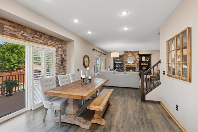 14057 Flintwood Ct, Apple Valley, MN 55124 - dining room featuring wood finished floors, recessed lighting, healthy amount of natural light, and stairs