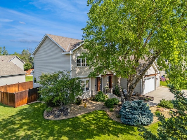 14057 Flintwood Ct, Apple Valley, MN 55124 - view of front of home with concrete driveway, an attached garage, and a shingled roof