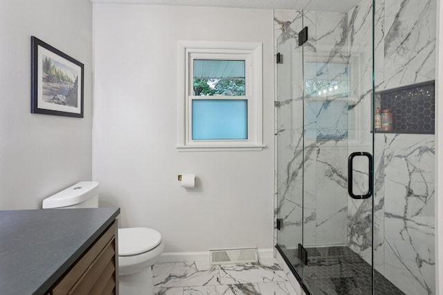 9320 Revere Ln N, Maple Grove, MN 55369 - bathroom featuring marble finish floors, toilet, vanity, baseboards, and a marble finish shower
