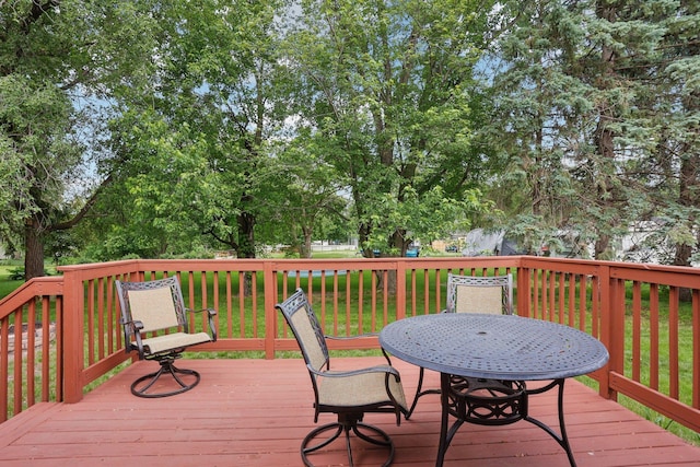 9320 Revere Ln N, Maple Grove, MN 55369 - deck featuring a yard and view of scattered trees