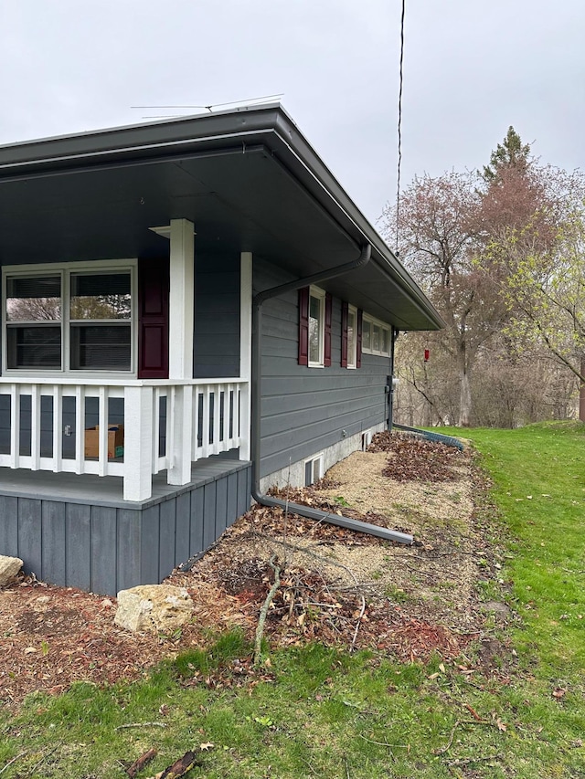 332 Pleasant Ave, Ellsworth, WI 54011 - view of property exterior featuring covered porch