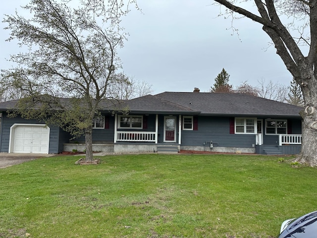 332 Pleasant Ave, Ellsworth, WI 54011 - ranch-style home with covered porch, an attached garage, a front lawn, and driveway