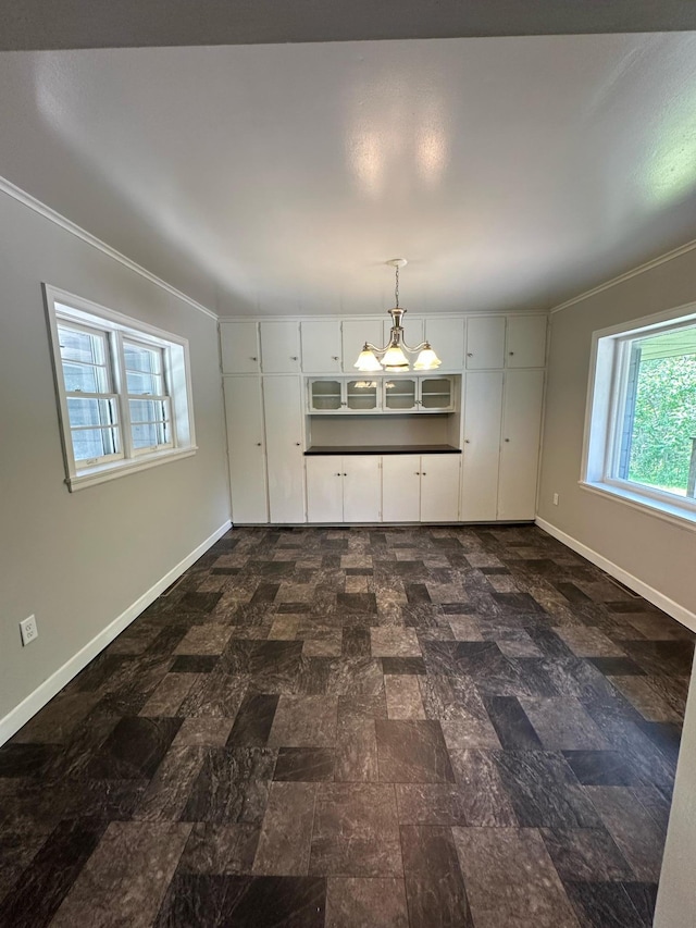 332 Pleasant Ave, Ellsworth, WI 54011 - unfurnished dining area featuring baseboards