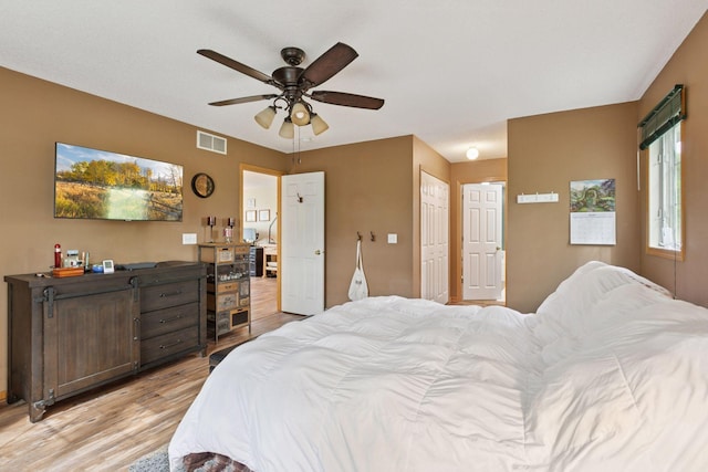 9026 Merrimac Ln N, Maple Grove, MN 55311 - bedroom with light wood-style flooring and ceiling fan