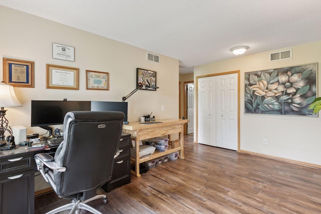 9026 Merrimac Ln N, Maple Grove, MN 55311 - office featuring wood finished floors, a textured ceiling, and baseboards